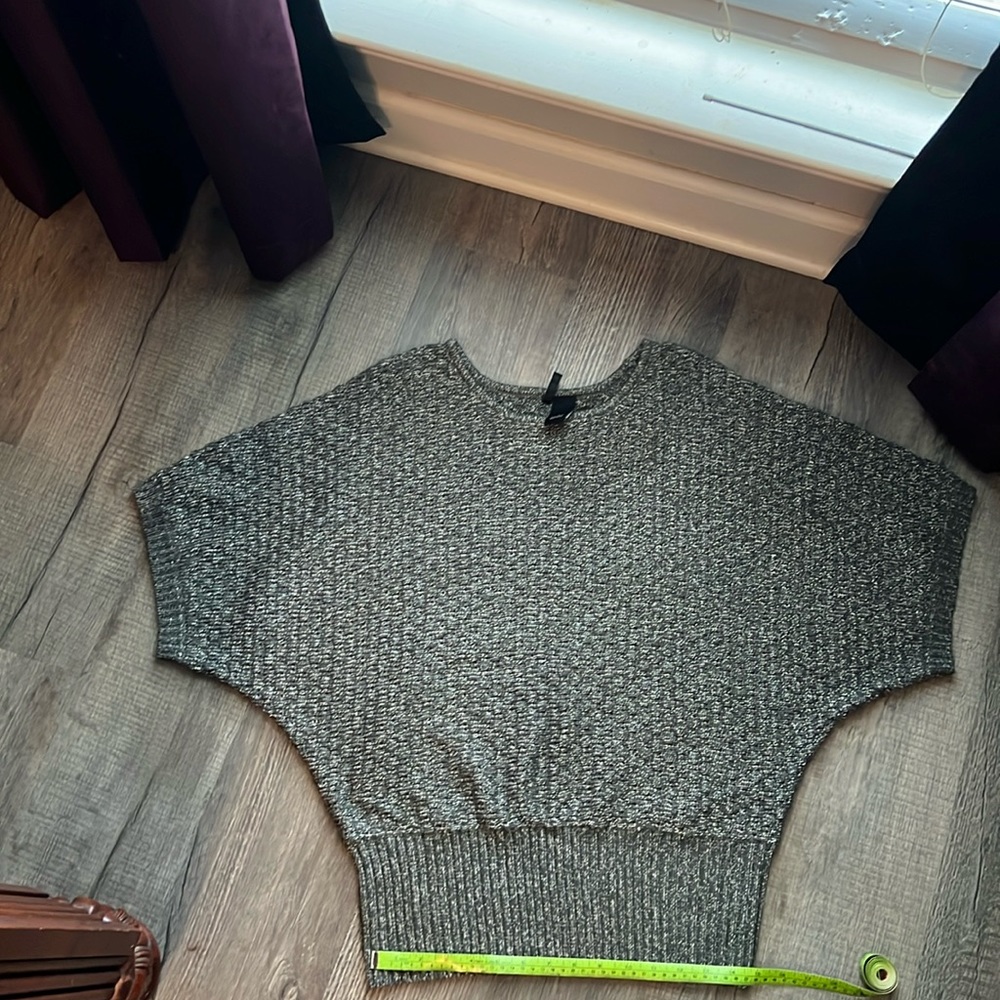 Large, new directions sweater